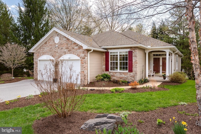1432 Quaker Rdg, West Chester, PA 19380 - single story home with a garage, a front yard, concrete driveway, and stone siding