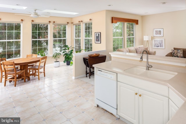 1432 Quaker Rdg, West Chester, PA 19380 - kitchen with a skylight, white cabinets, dishwasher, a sink, and open floor plan