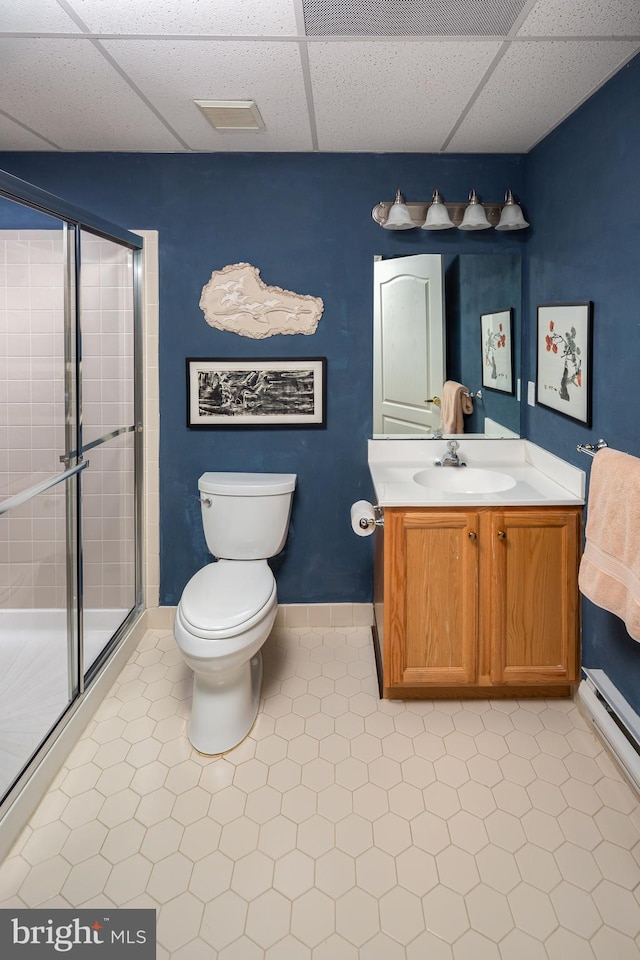 1432 Quaker Rdg, West Chester, PA 19380 - bathroom featuring a stall shower, baseboards, a drop ceiling, toilet, and vanity
