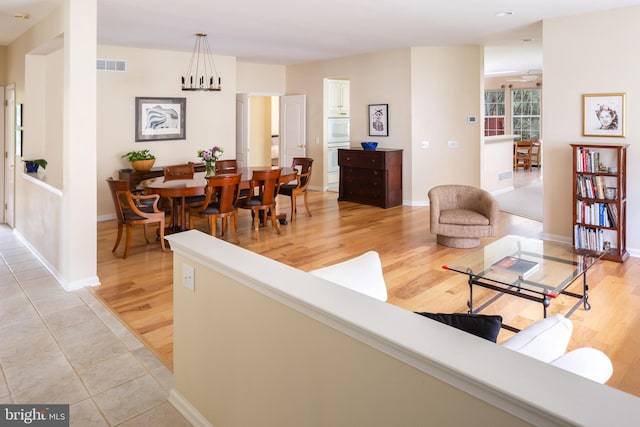 1432 Quaker Rdg, West Chester, PA 19380 - living room with visible vents, baseboards, recessed lighting, and light wood-style floors