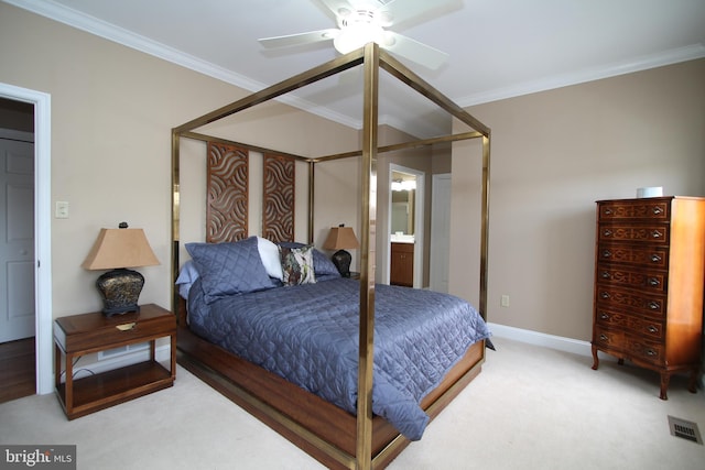carpeted bedroom featuring ceiling fan, baseboards, ornamental molding, and visible vents