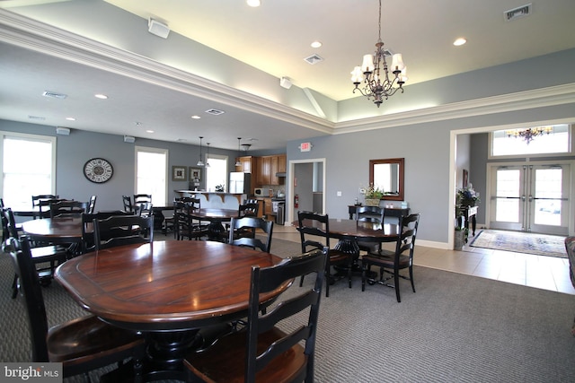 dining area with french doors, visible vents, and recessed lighting