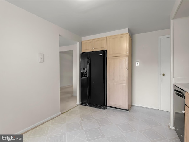 kitchen featuring stainless steel dishwasher, black refrigerator with ice dispenser, light brown cabinets, baseboards, and light floors