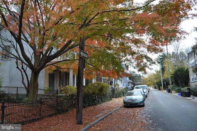 view of side of property with fence