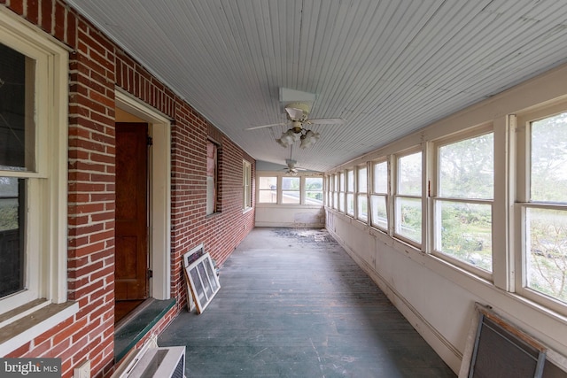 5342 Main St, Stephens City, VA 22655 - unfurnished sunroom with brick wall, a ceiling fan, wood finished floors, and wood ceiling