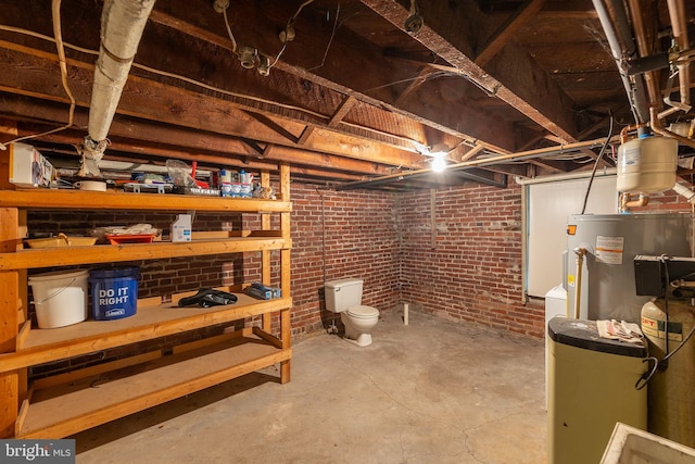 5342 Main St, Stephens City, VA 22655 - unfinished below grade area with water heater and brick wall