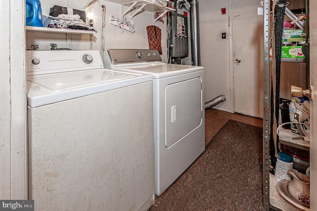 washroom with washer and dryer and electric panel