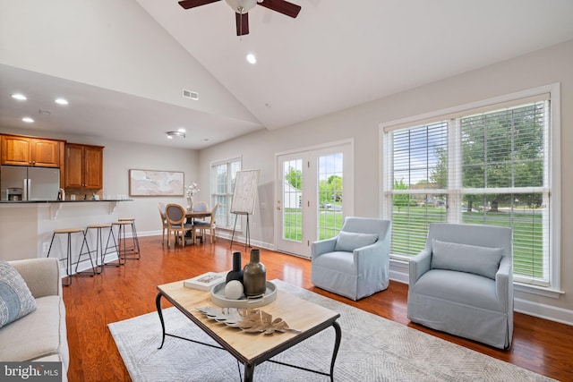 living room with wood finished floors, visible vents, recessed lighting, and ceiling fan