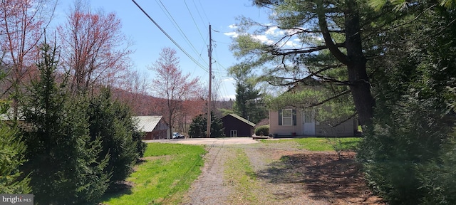 view of street featuring driveway