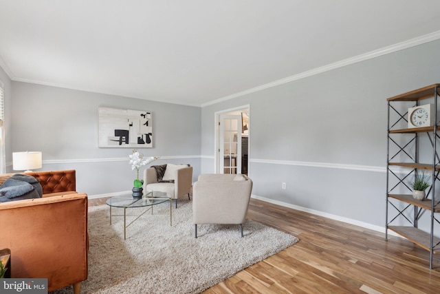 13126 Pelmira Ridge Ct, Herndon, VA 20171 - living area featuring wood finished floors, crown molding, and baseboards