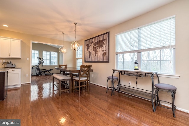 411 Cope Ct, Sellersville, PA 18960 - dining space with dark wood finished floors, baseboards, and a chandelier
