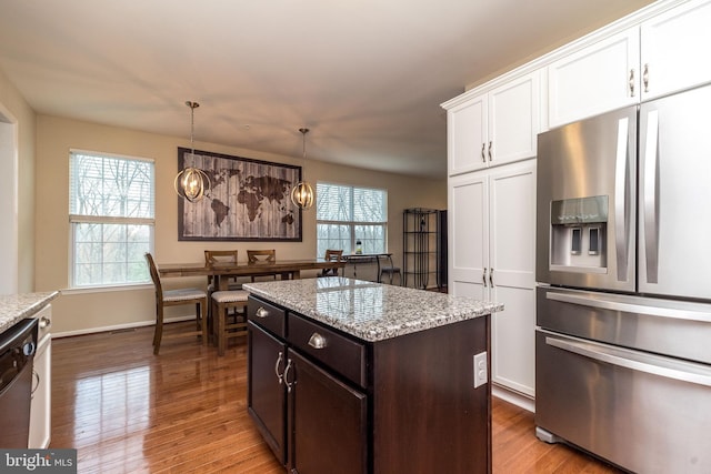 411 Cope Ct, Sellersville, PA 18960 - kitchen featuring white cabinets, dishwasher, wood finished floors, and stainless steel fridge
