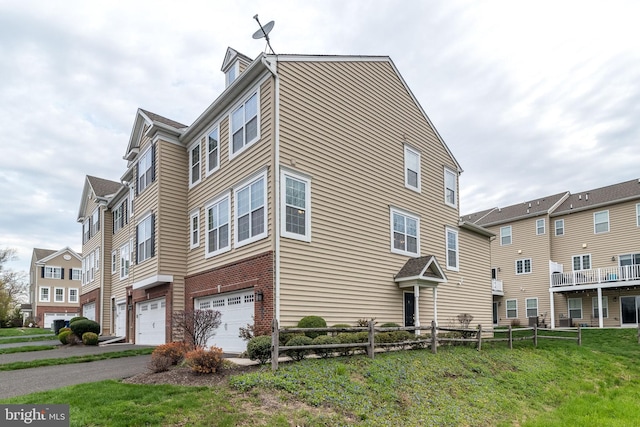 411 Cope Ct, Sellersville, PA 18960 - exterior space featuring fence and a garage