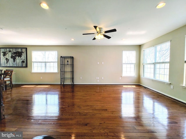 411 Cope Ct, Sellersville, PA 18960 - unfurnished living room with recessed lighting, wood finished floors, a wealth of natural light, and a ceiling fan