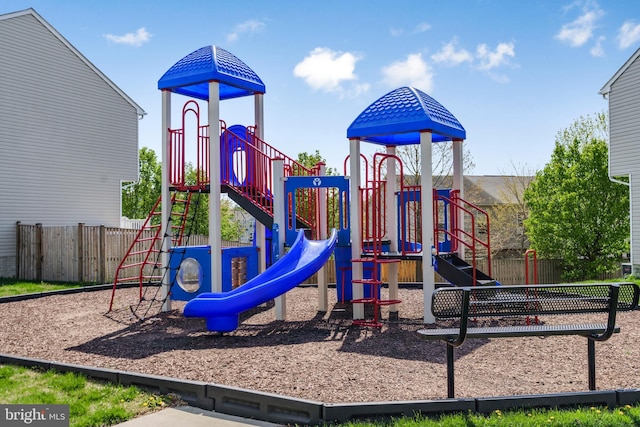 community play area featuring fence