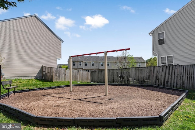 view of jungle gym with fence