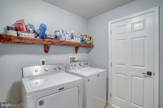 laundry area featuring laundry area and washer and clothes dryer