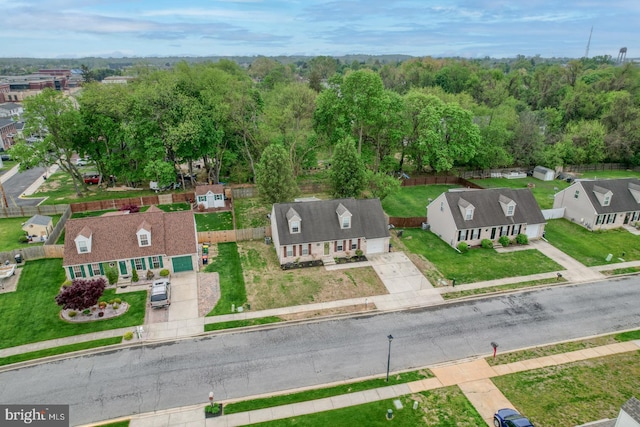 birds eye view of property with a residential view