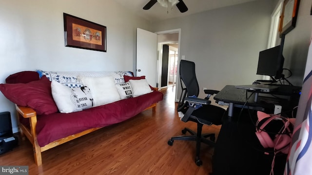home office with ceiling fan and wood finished floors