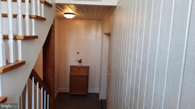 hallway featuring stairs