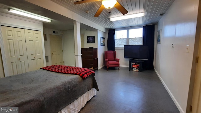 bedroom with baseboards, a ceiling fan, tile patterned floors, and visible vents