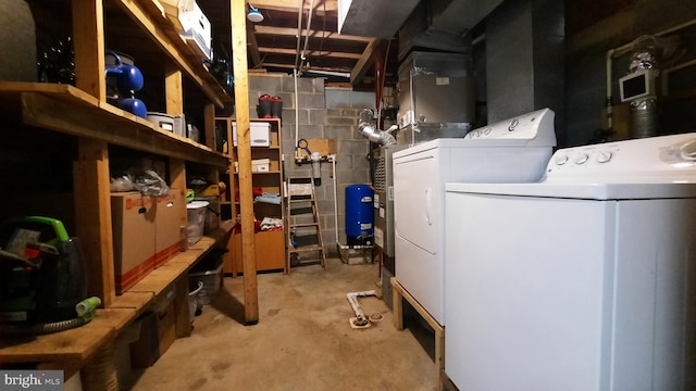 interior space with washer and clothes dryer