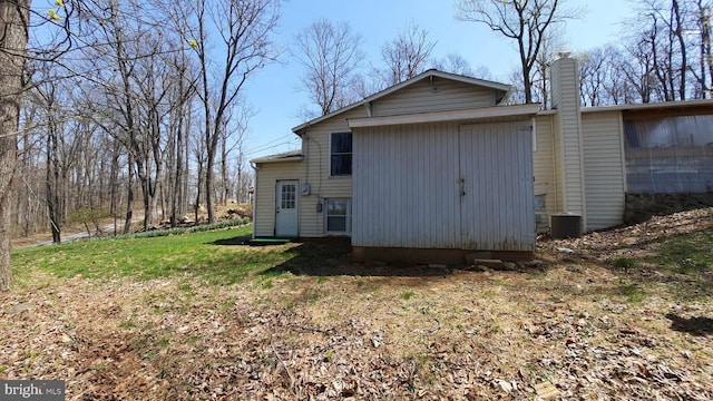 view of outbuilding with central AC