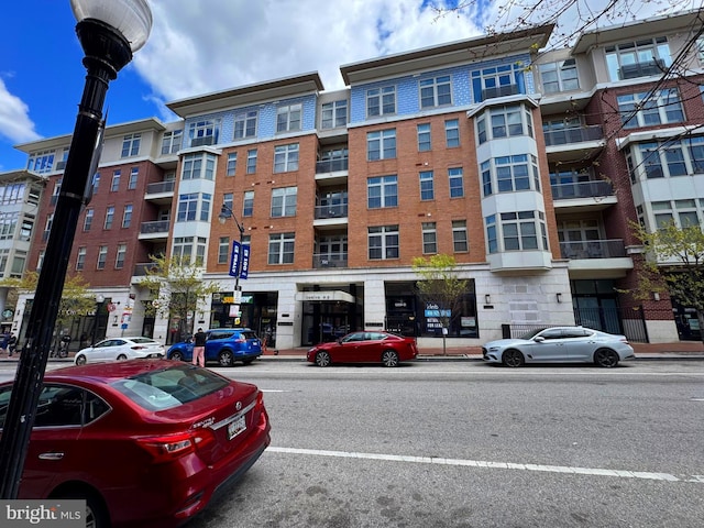 1209 N Charles St N Unit 209, Baltimore, MD 21201 - view of apartment building / complex