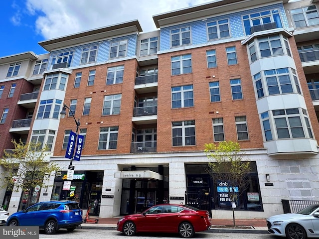 1209 N Charles St N Unit 209, Baltimore, MD 21201 - view of apartment building / complex