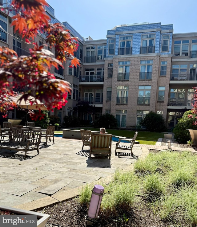 1209 N Charles St N Unit 209, Baltimore, MD 21201 - view of property's community featuring a patio area
