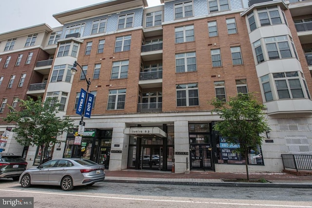 1209 N Charles St N Unit 209, Baltimore, MD 21201 - view of apartment building / complex