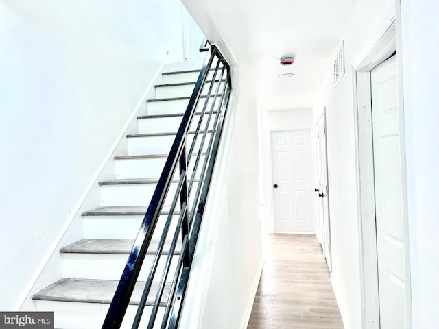580 Bath St, Bristol, PA 19007 - staircase featuring wood finished floors and baseboards