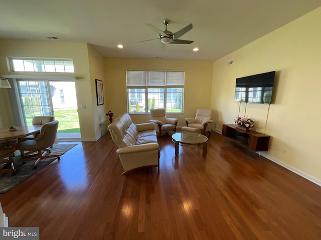35 Galileo Dr, Cranbury, NJ 08512 - living room with baseboards, dark wood-type flooring, ceiling fan, and a healthy amount of sunlight