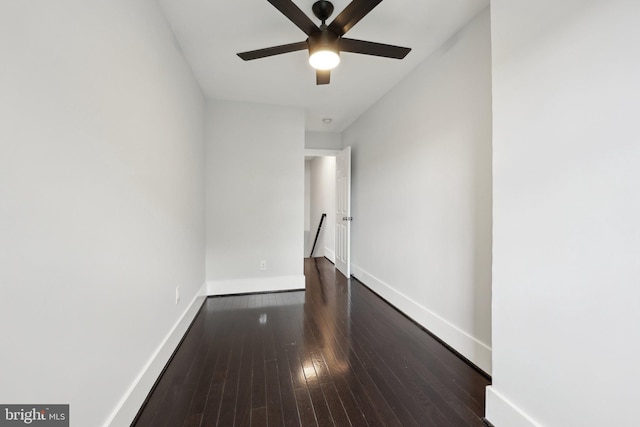 2026 Savannah Pl SE, Washington, DC 20020 - unfurnished room with hardwood / wood-style floors, a ceiling fan, and baseboards