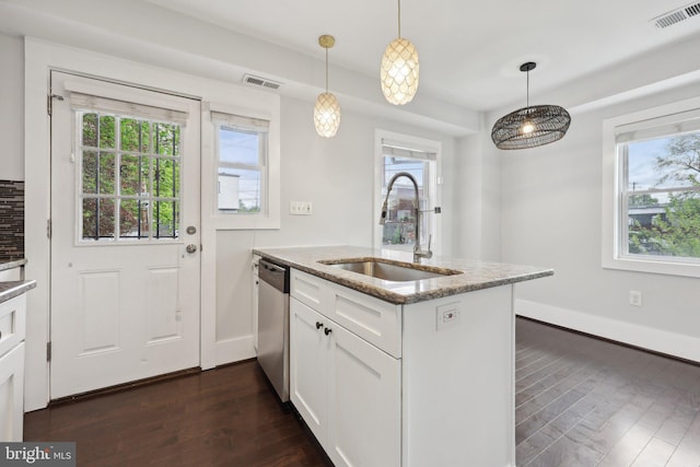 2026 Savannah Pl SE, Washington, DC 20020 - kitchen featuring stainless steel dishwasher, dark wood-type flooring, a sink, and visible vents