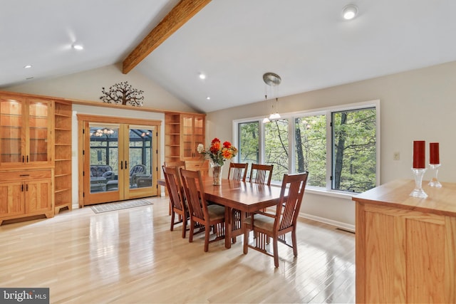 dining room featuring french doors, recessed lighting, light wood-style flooring, and vaulted ceiling with beams