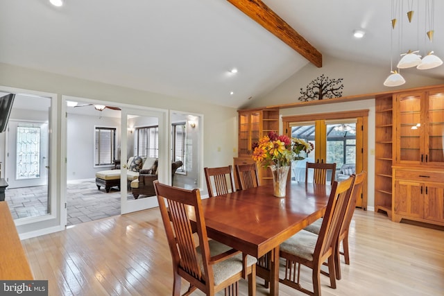 dining room with recessed lighting, vaulted ceiling with beams, french doors, and light wood-type flooring