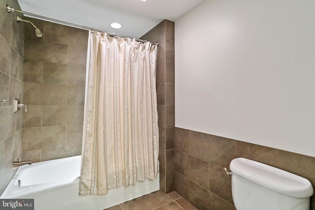 bathroom with shower / tub combo with curtain, toilet, recessed lighting, tile walls, and tile patterned flooring