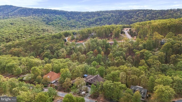drone / aerial view with a view of trees