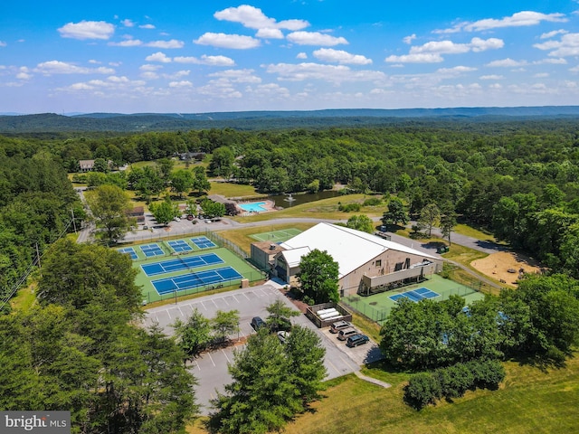 bird's eye view featuring a forest view