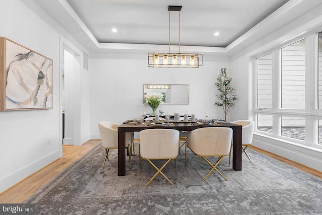 3418 Arnold Ln, Falls Church, VA 22042 - dining space with visible vents, baseboards, a raised ceiling, and wood finished floors