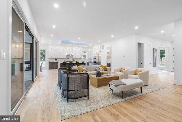 3418 Arnold Ln, Falls Church, VA 22042 - living room with light wood-style floors, plenty of natural light, and recessed lighting