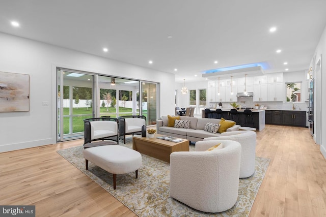 3418 Arnold Ln, Falls Church, VA 22042 - living room featuring light wood-style floors, baseboards, and recessed lighting