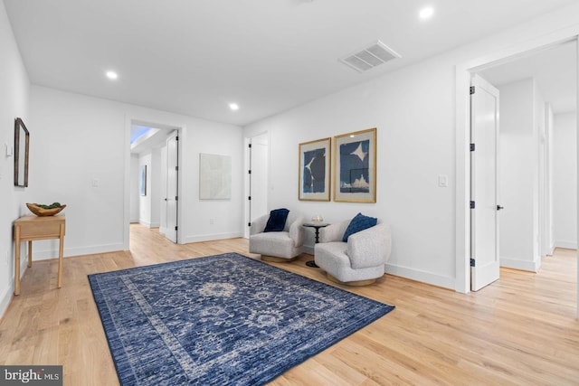 3418 Arnold Ln, Falls Church, VA 22042 - living area featuring recessed lighting, light wood finished floors, visible vents, and baseboards