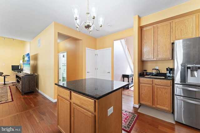 311 Patsy Ct, West Deptford, NJ 08066 - kitchen featuring dark stone countertops, a chandelier, stainless steel fridge with ice dispenser, dark wood finished floors, and a kitchen island