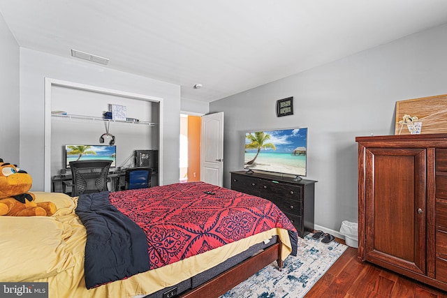 311 Patsy Ct, West Deptford, NJ 08066 - bedroom with baseboards, visible vents, a closet, and dark wood finished floors