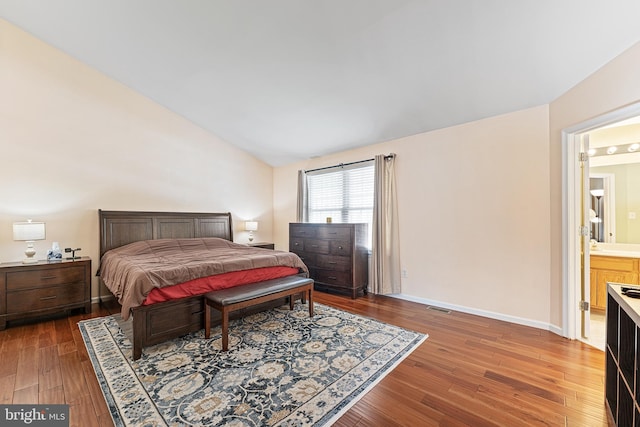 311 Patsy Ct, West Deptford, NJ 08066 - bedroom featuring lofted ceiling, hardwood / wood-style floors, visible vents, and baseboards