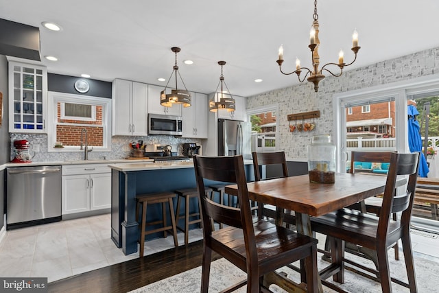 1448 Sheridan St NW, Washington, DC 20011 - dining room with a chandelier, healthy amount of natural light, and recessed lighting