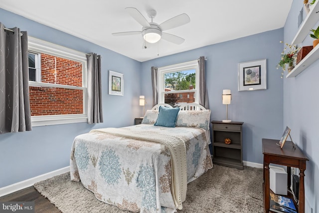 1448 Sheridan St NW, Washington, DC 20011 - bedroom with baseboards and ceiling fan