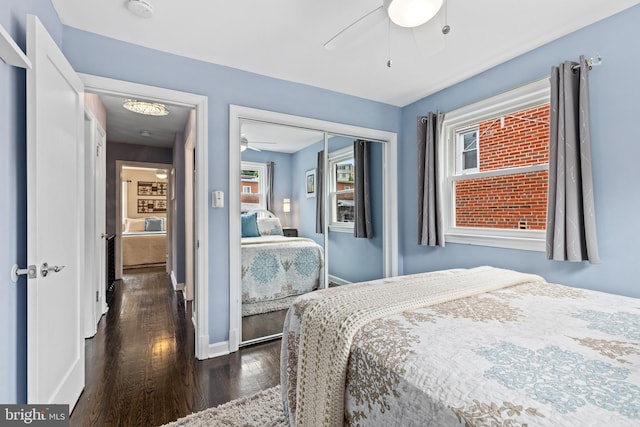 1448 Sheridan St NW, Washington, DC 20011 - bedroom with dark wood-style floors, a closet, baseboards, and ceiling fan